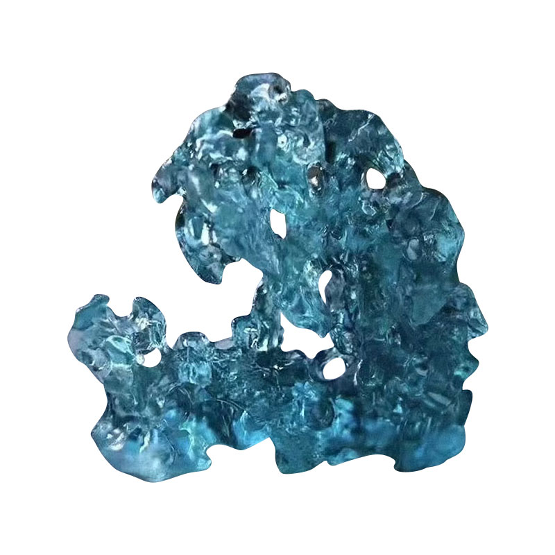 Ornáidí gloine daite gorm i gcruth carraige