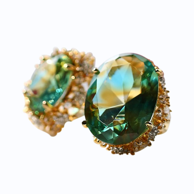 Fáinní gloine glasa le pillíní cluaise órga